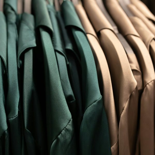 Row of clothes hanging on hangers